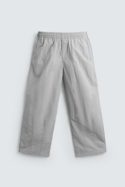 Zara СПОРТИВНЫЕ ШТАНЫ ИЗ ФУНКЦИОНАЛЬНОЙ ТКАНИ В КОНТРАСТНУЮ полоску 498380745-811-2