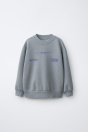 Zara Надпись SUDADERA серого цвета